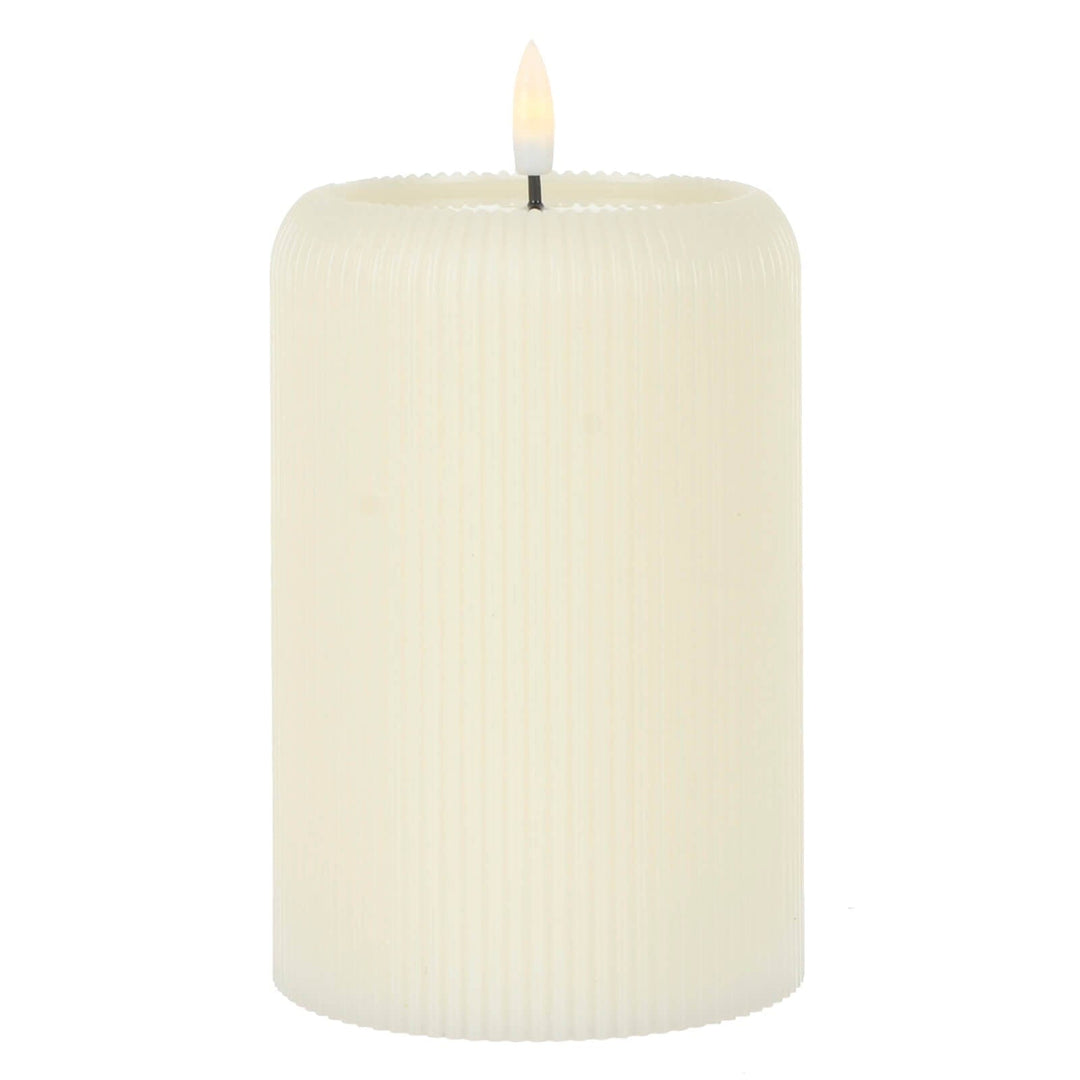 Cream colour ridged candle with artificial flame