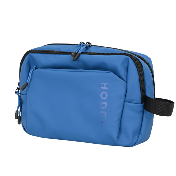 side view of hodge and hodge aventura travel wash bag with rubber zips and black carry handle
