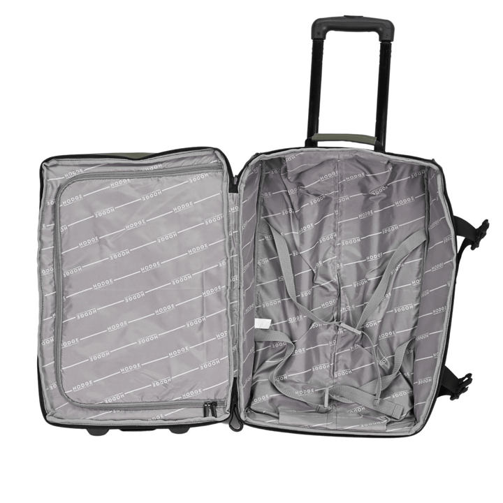 shot of suitcase interior featuring large main compartment with branded lining, compression straps and an additional zipped section on opposite side