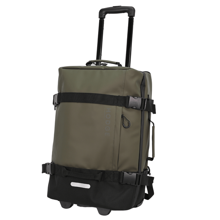 side view of small hodge and hodge safari suitcase with telescopic handle, rounded zip pulls and stylish security buckles