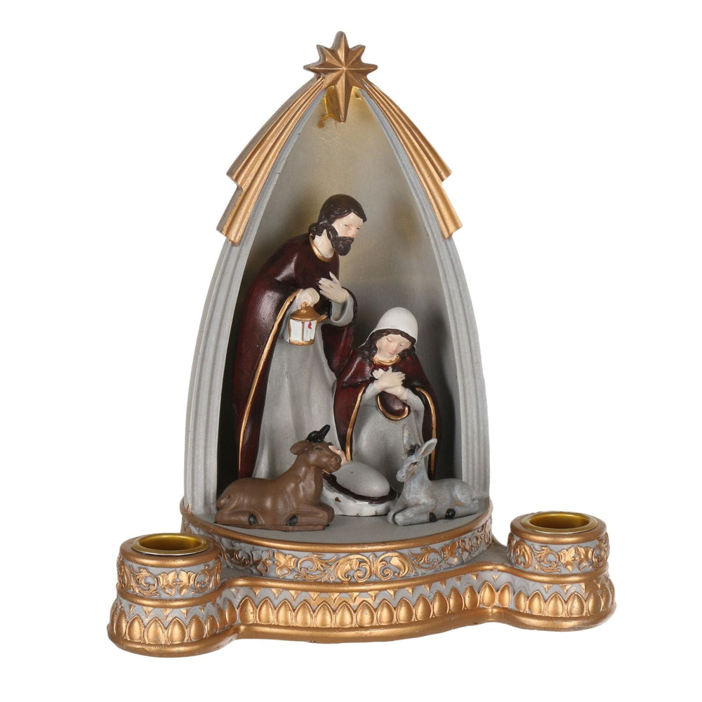 side view of nativity scene with intricate gold detail