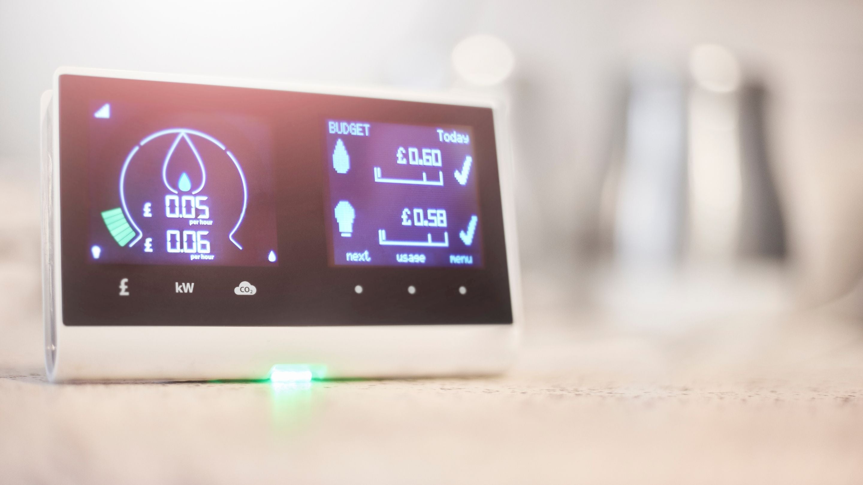 smart home meter for energy consumption resting on kitchen counter