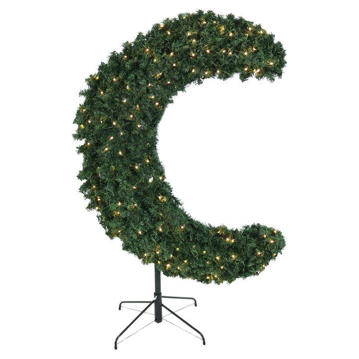 Curved Christmas tree with lights on a stand against a white background