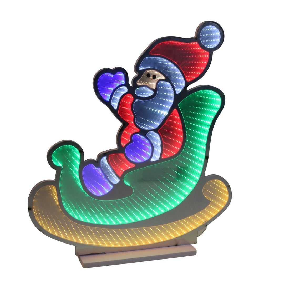 Colorful LED light display of santa in a sleigh with a white background