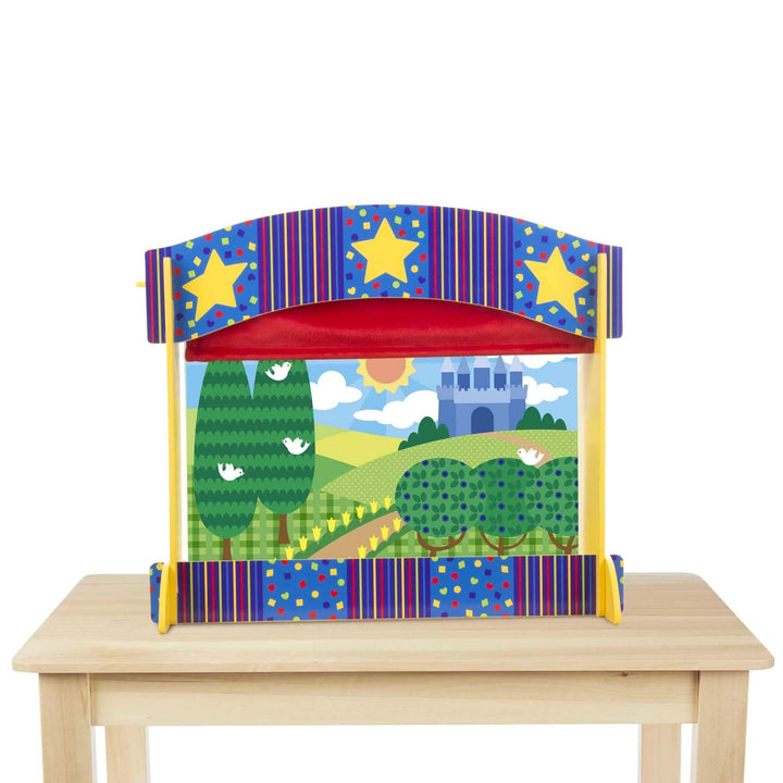 colourful tabletop puppet theatre on wooden table