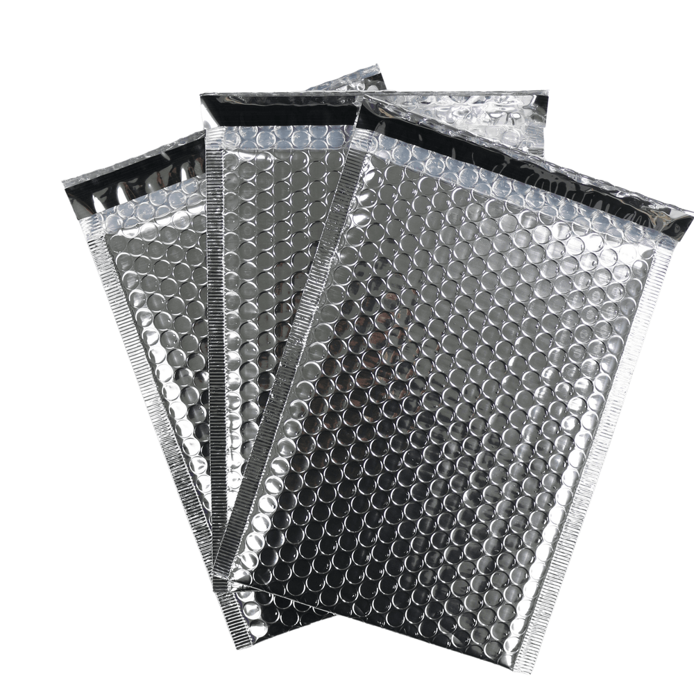 set of 3 silver self sealing bubble mailers on white background