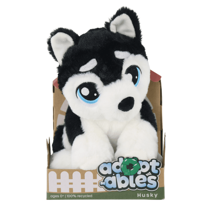 adoptables soft black and white husky dog toy in kennel style cardboard packages with ages 0+ and 100% recycled on packaging
