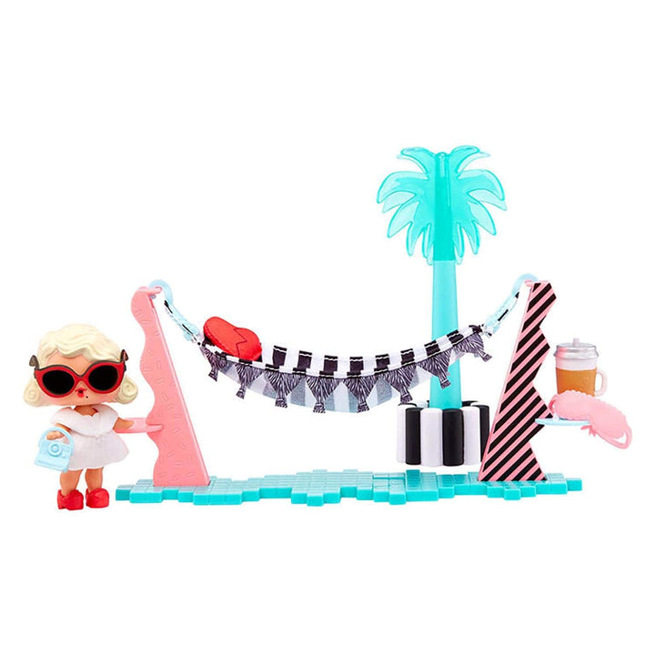 Lol surprise doll wearing sunglasses beside a hammock and palm tree