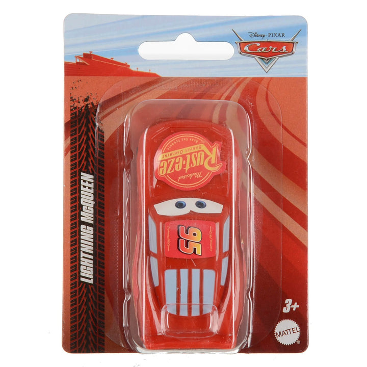 Red toy car in packaging with &