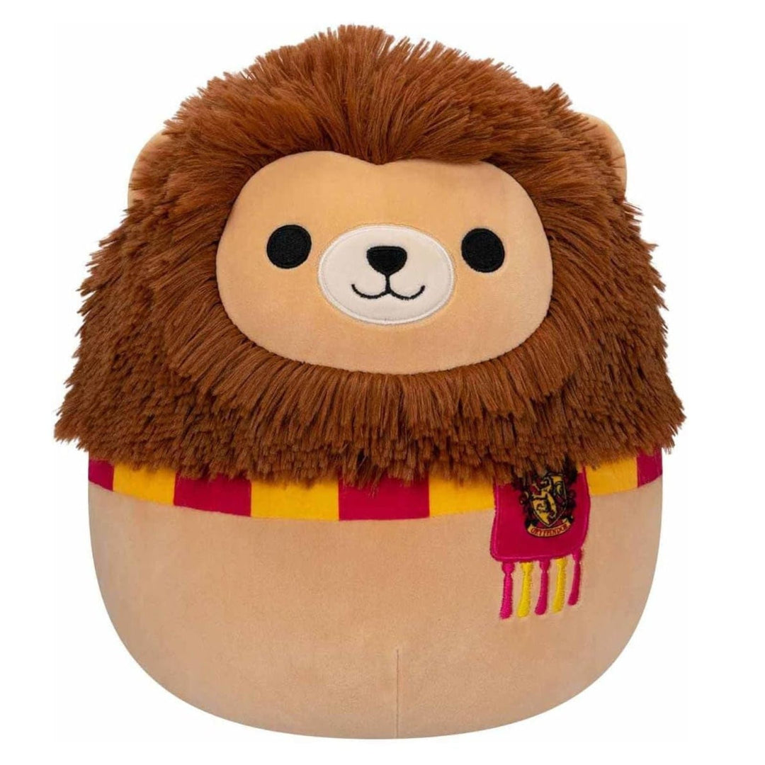 Plush toy gryffindor lion with a scarf on a white background