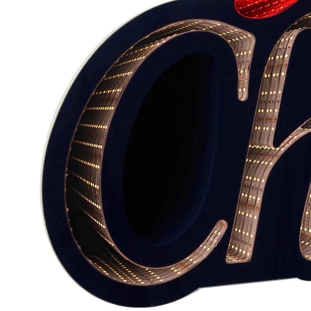 Detail of LED lights on a Merry Christmas infinity mirror deoration
