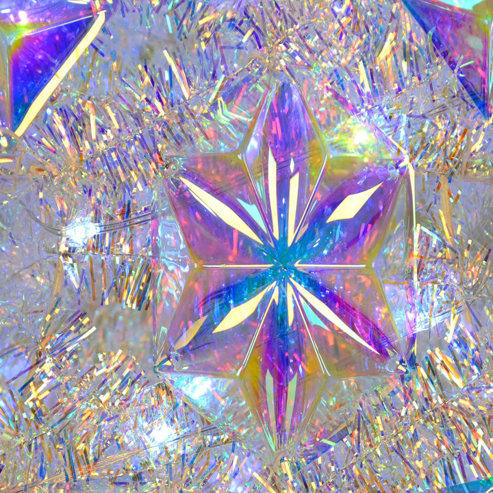 Close up of a star panel on a tinsel Christmas tree