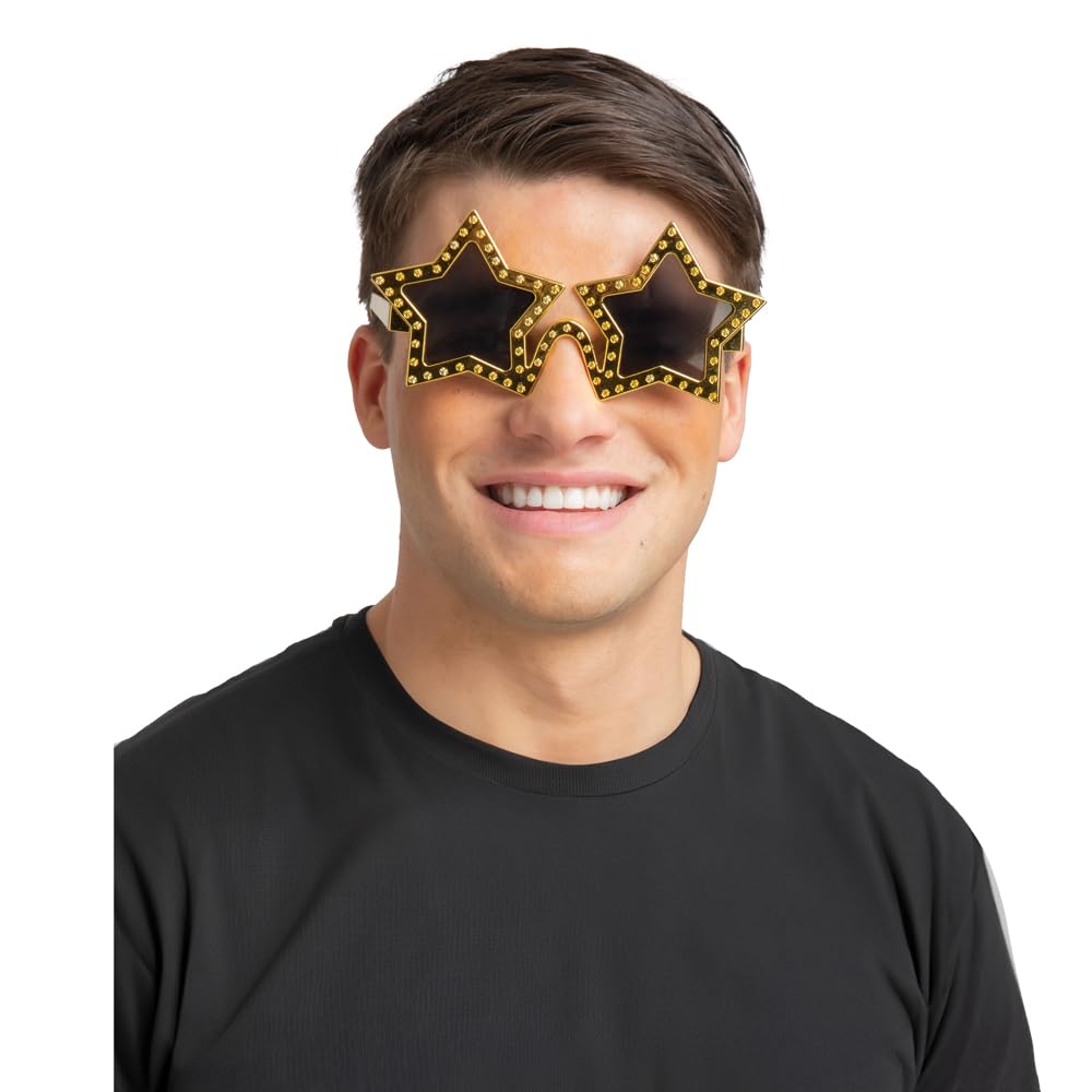 Man wearing a pair of gold star shaped sunglasses with diamante decoration