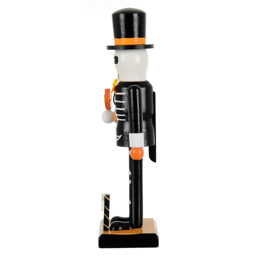  Side view of a black and white Skeleton figure with top hat