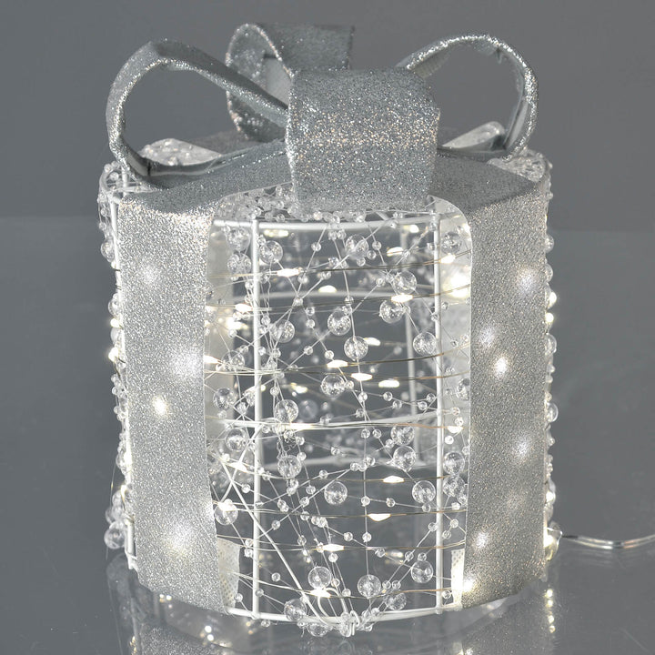 Single beaded gift box with glitter ribbon and white LED lights