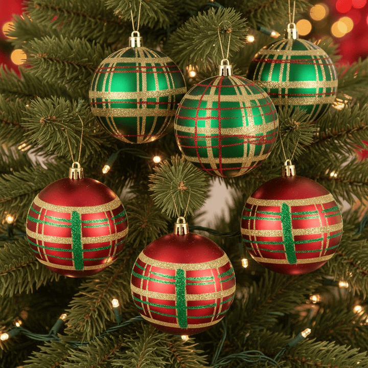 Green and red plaid Christmas ornaments on a tree with blurred lights in the background