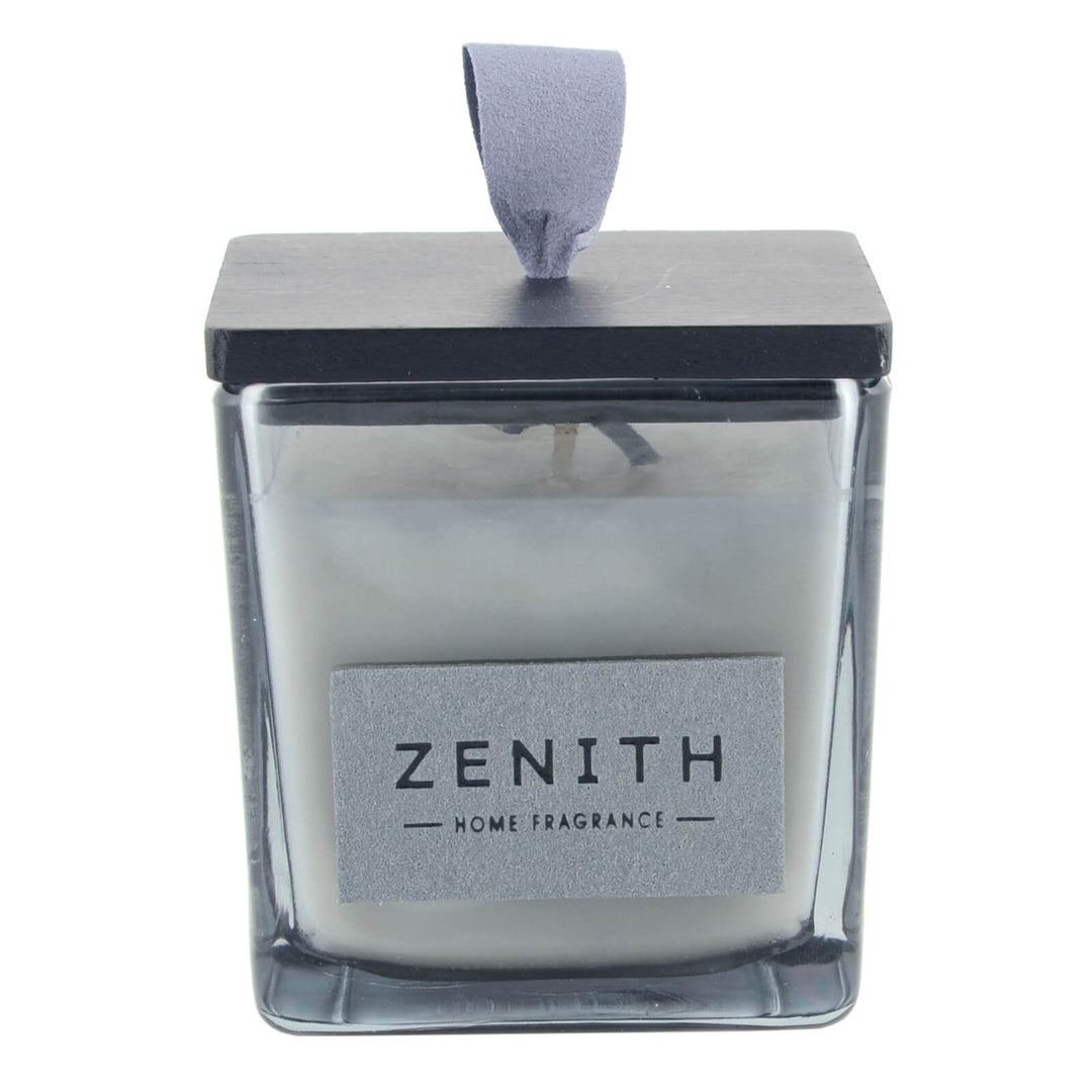 Candle in a glass container with a black lid labeled 'Zenith Home Fragrance' on a white background