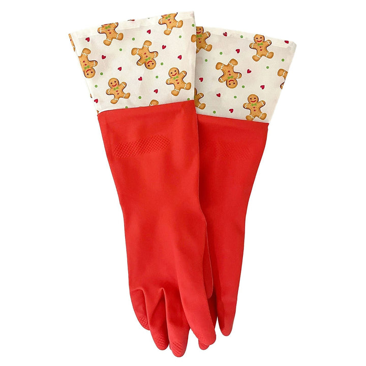 Red christmas cleaning gloves with gingerbread man pattern on cuffs on a white background