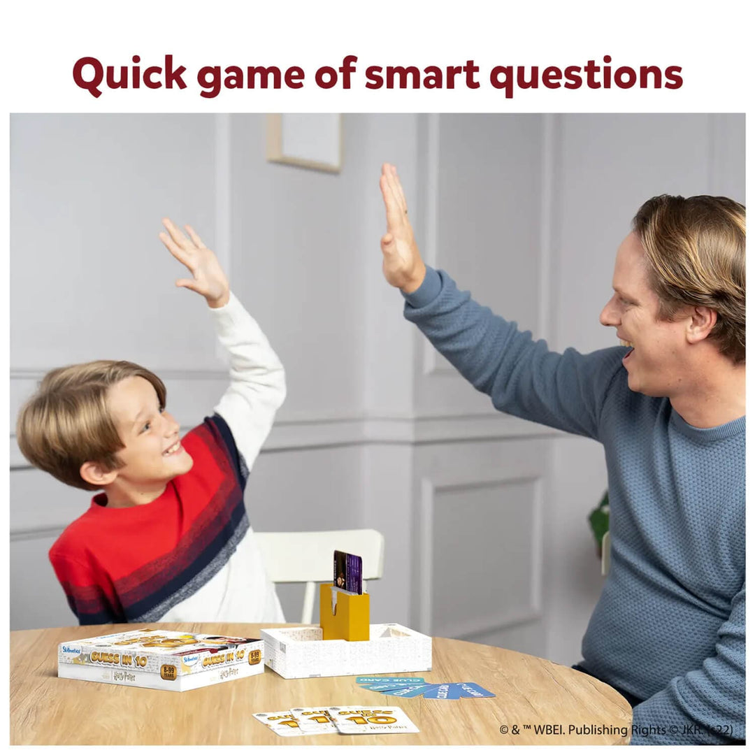 Man and boy high fiving while playing the Harry Potter Guess in 10 questions game