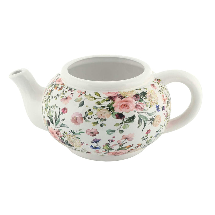 White teapot planter with rose floral pattern