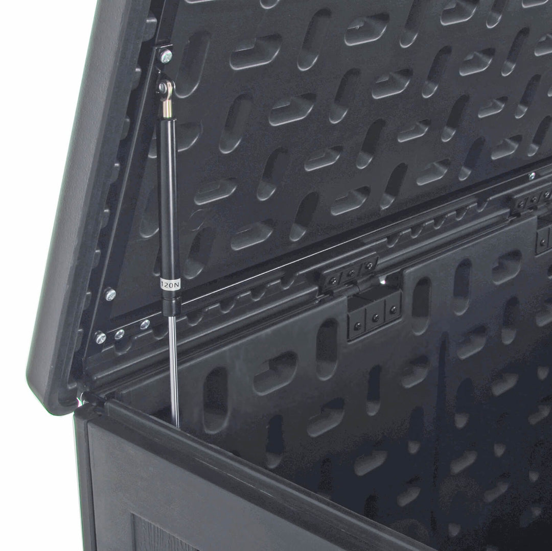 Close up of a gas assist powered lid lift on a deck box