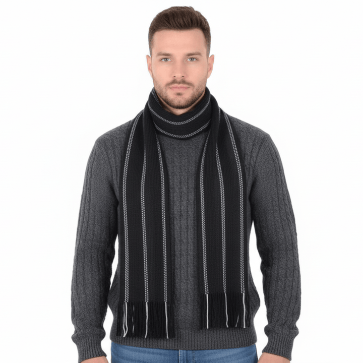 Man wearing a gray sweater and black scarf on a white background