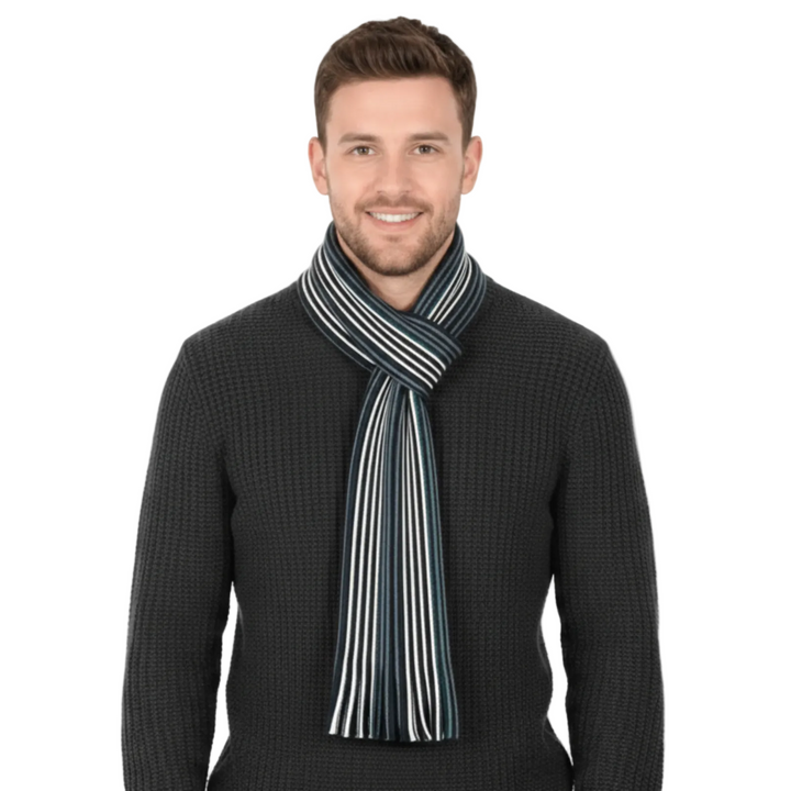 Man wearing a black sweater and striped scarf on a white background