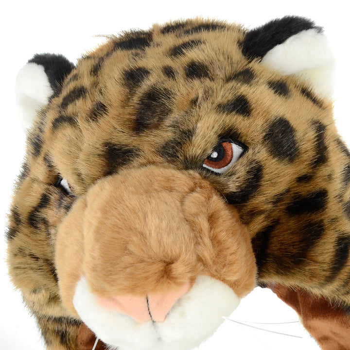 Close up of the head of a leopard on a kids trapper hat