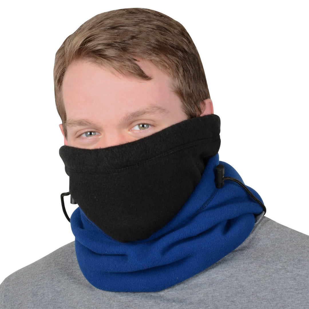 Person wearing a black face cover with blue fleece neck band