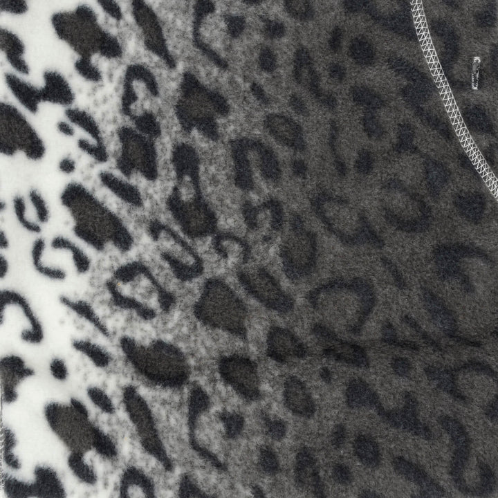 Close up of grey and white snow leopard animal print fleece fabric