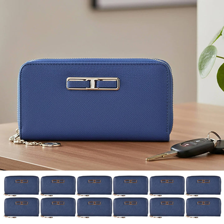 Blue purse with a gold clasp on a wooden surface, with car keys beside it.