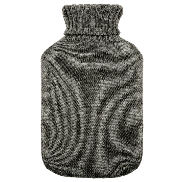 Dark grey knitted cover on a hot water bottle