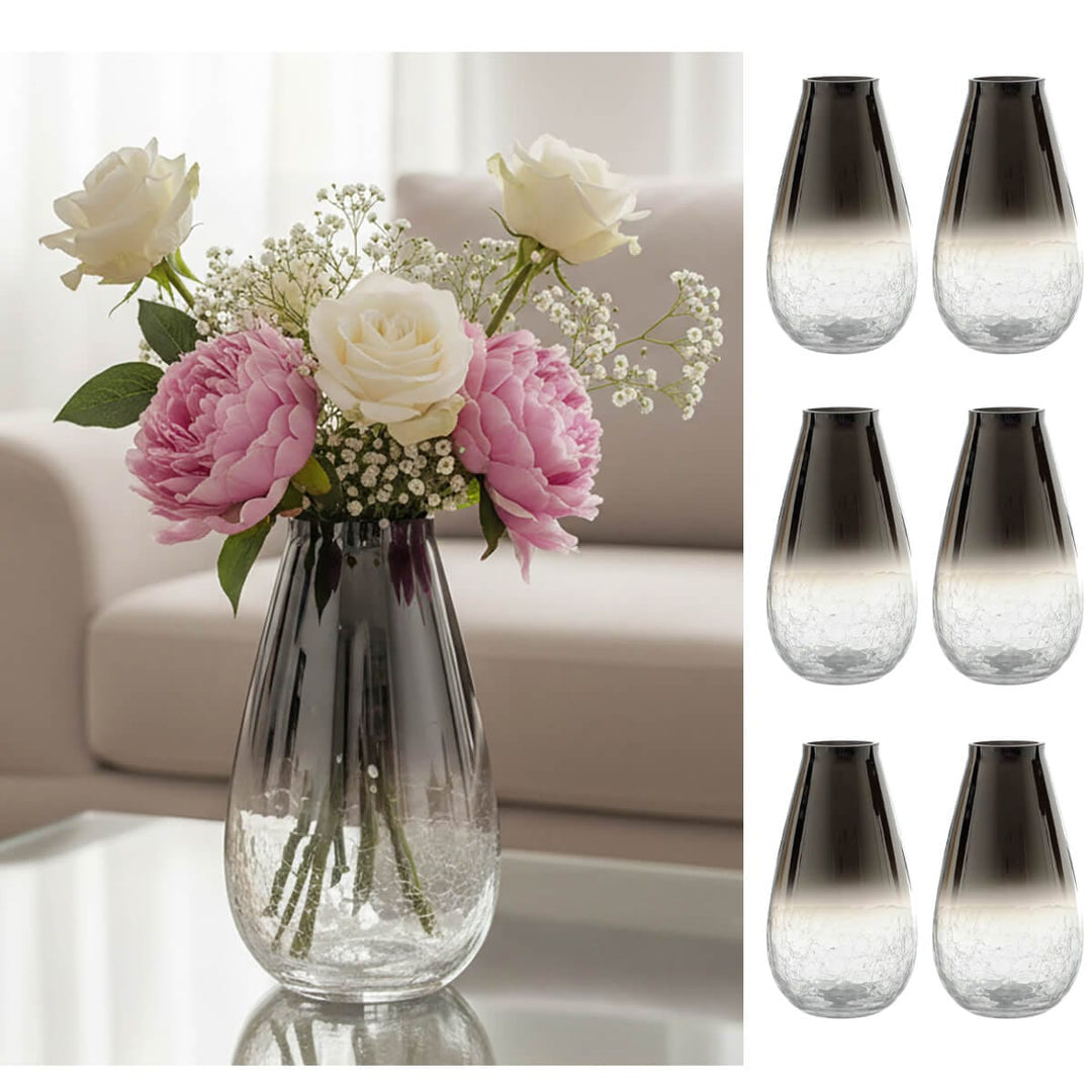 Crackle glass smoked ombre vase with pink and white flowers and six gradient vases on a neutral background