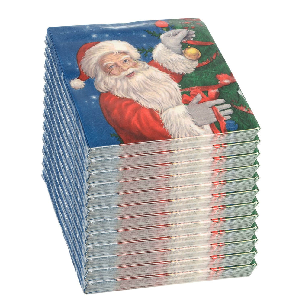 Stack of 12 packs of Christmas santa napkins on a white background