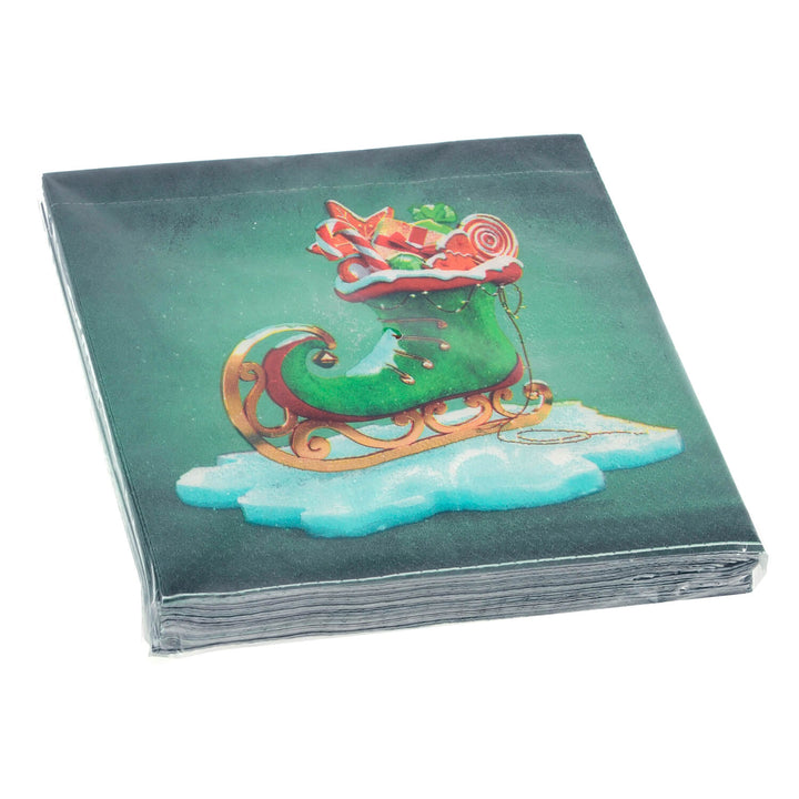 Pack of green Christmas napkins with elf ice skate and gift design on a white background