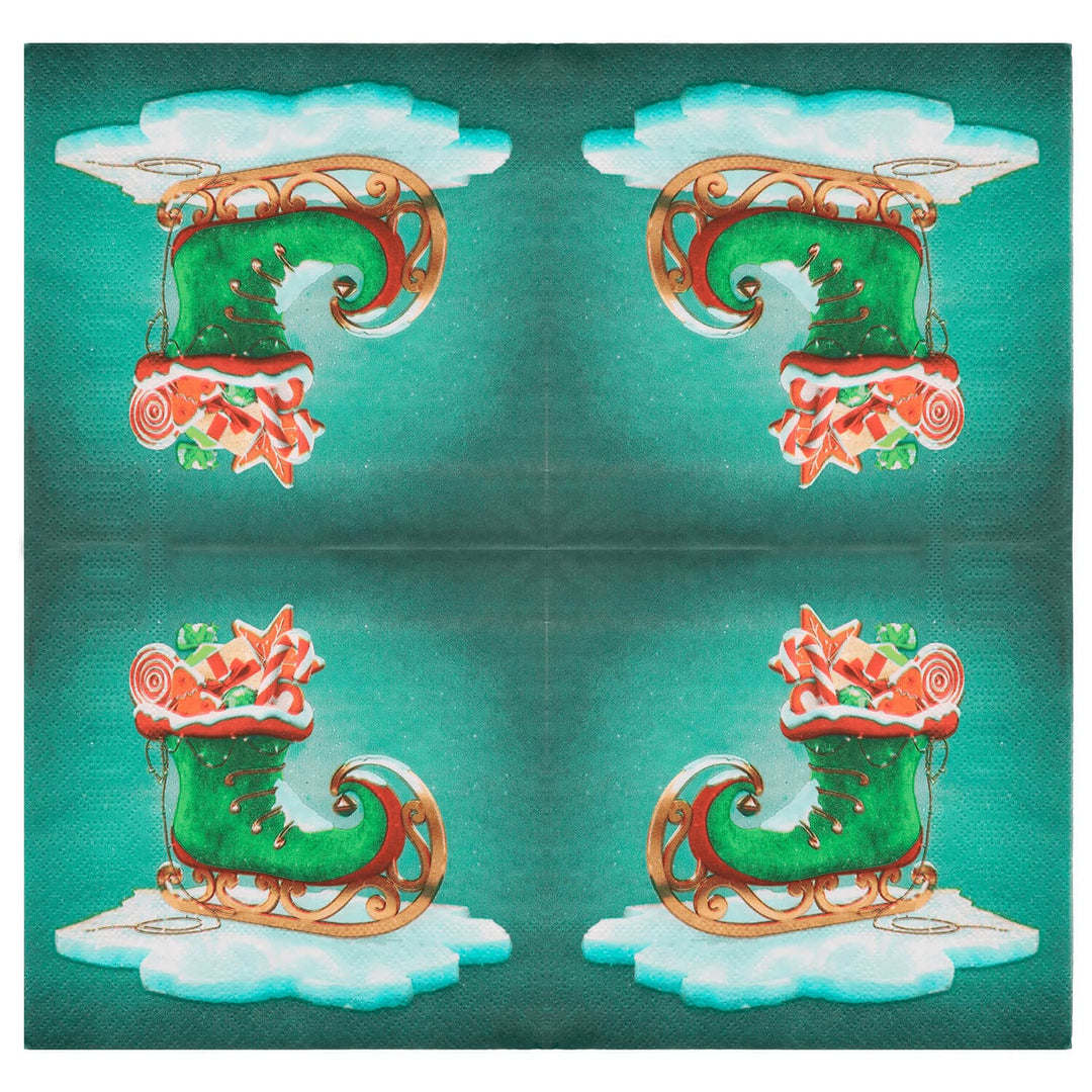 Green Christmas napkin opened out to show elf style ice skate design