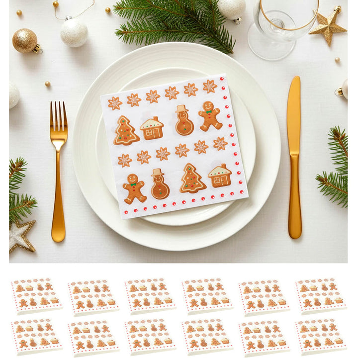 Gingerbread theme napkin on a Christmas dinner table with gold cutlery