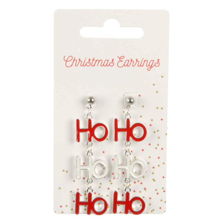 Display card with Christmas earrings with Ho Ho Ho letters in red and white on a white background