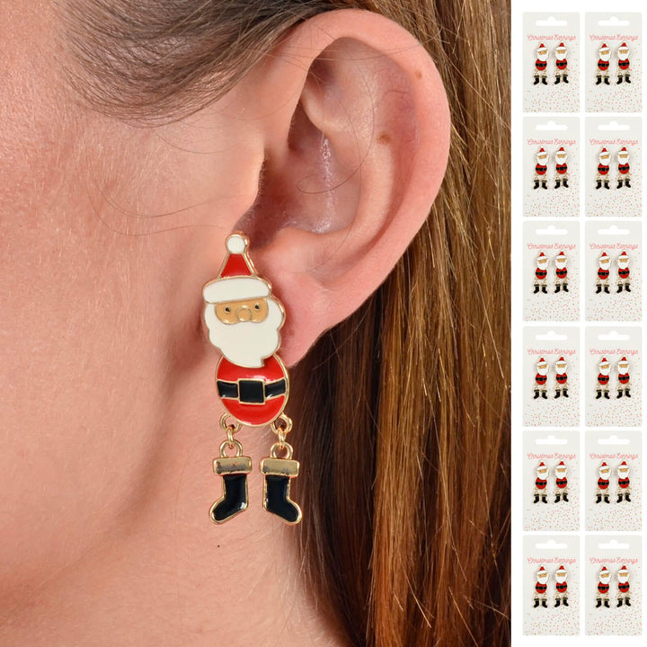 Person wearing  Santa Christmas earring with 12 display cards of Santa earrings down one side