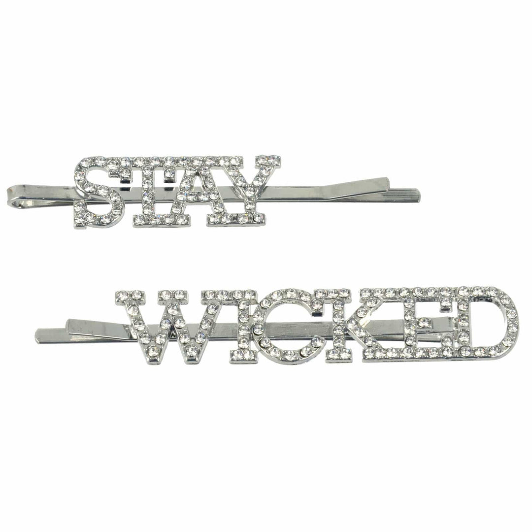 Silver hair clips with 'STAY WICKED' text and diamante jewels on a white background