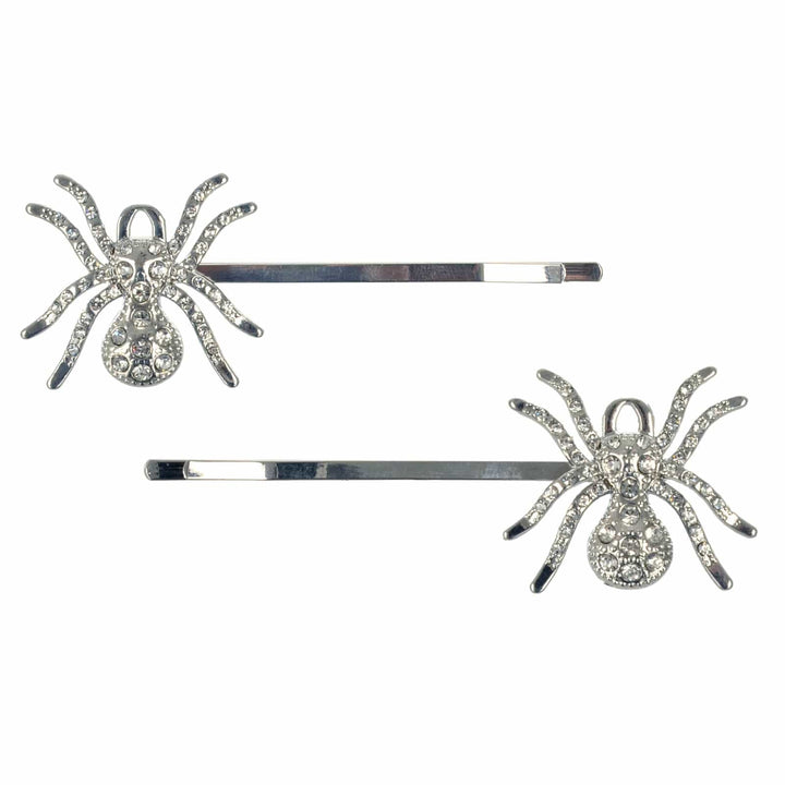 Two spider-shaped hair pins with diamante silver spiders on a white background
