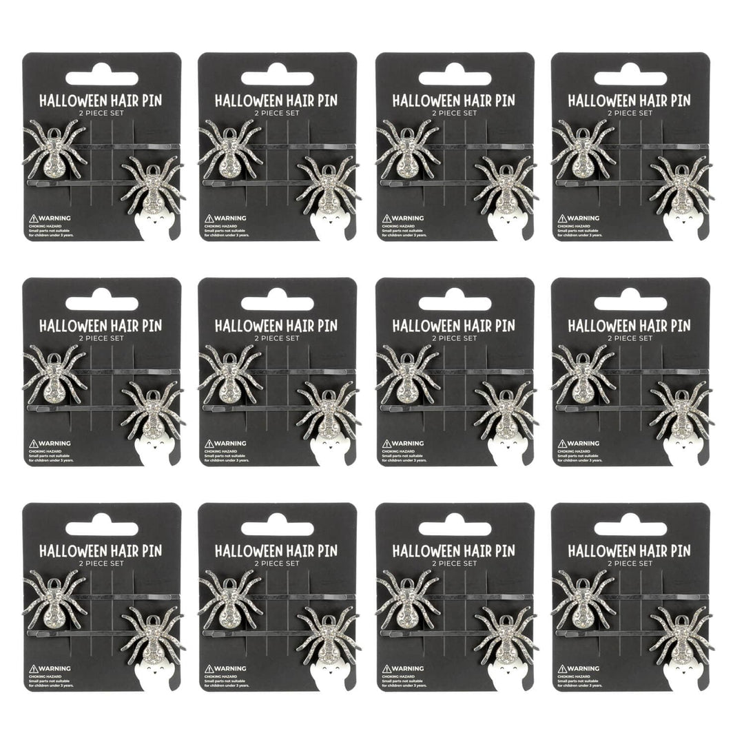 12 display cards with silver spider Halloween hair pins on a white background
