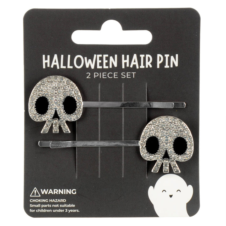 Display card with a set of Halloween hair pins with silver skulls and jewels
