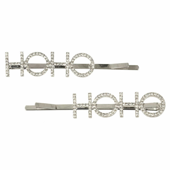 Two silver hair clips with &