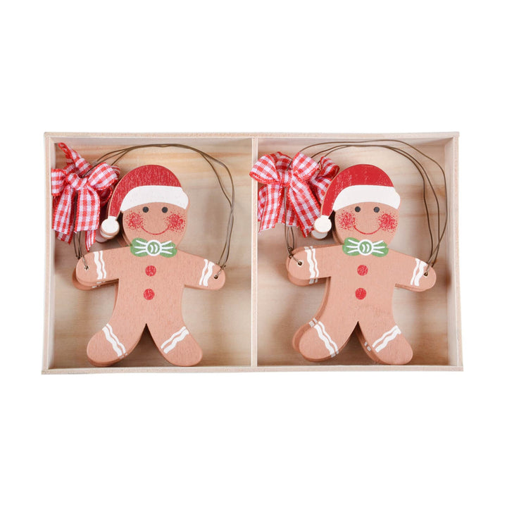 Box of 6 wooden gingerbread men Christmas tree decorations on a white background