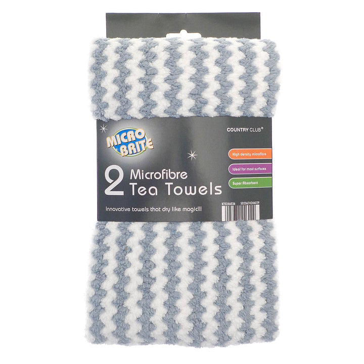 Two Micro Brite microfibre tea towels in a blue and white wavy pattern, packaged in a black cardboard sleeve with a grey header card.