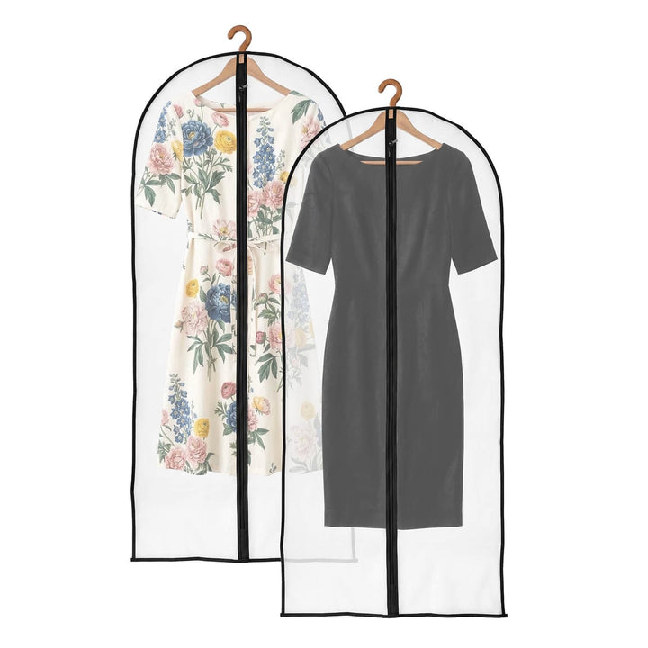 Two clear zippered dress and suit storage bags hanging on wooden hangers against a white background, each containing a short-sleeve dress