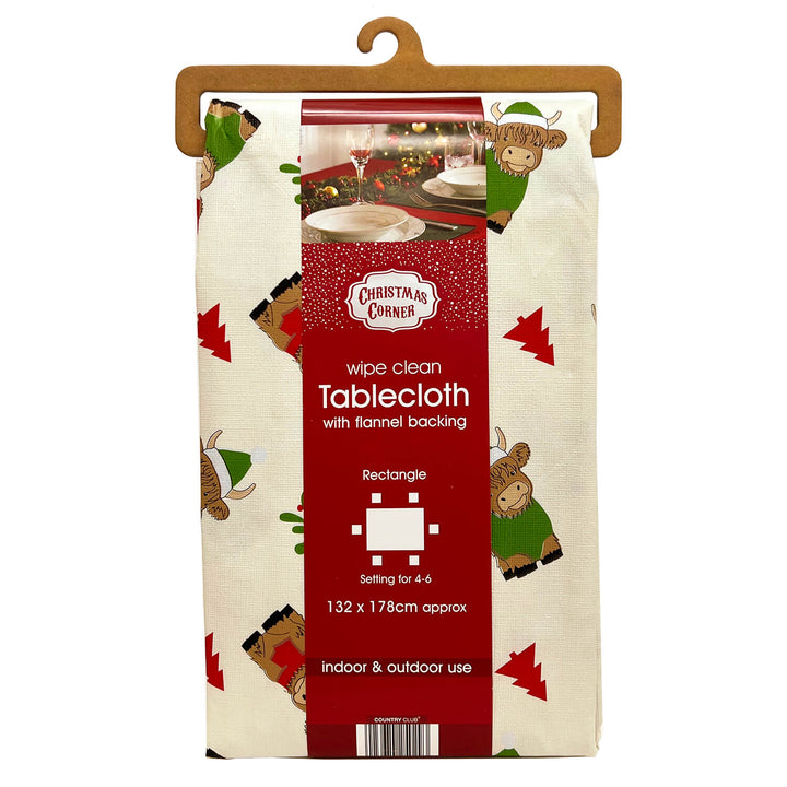 Christmas table cloth with Highland Cows designs and wipe clean surface in packaging sleeve