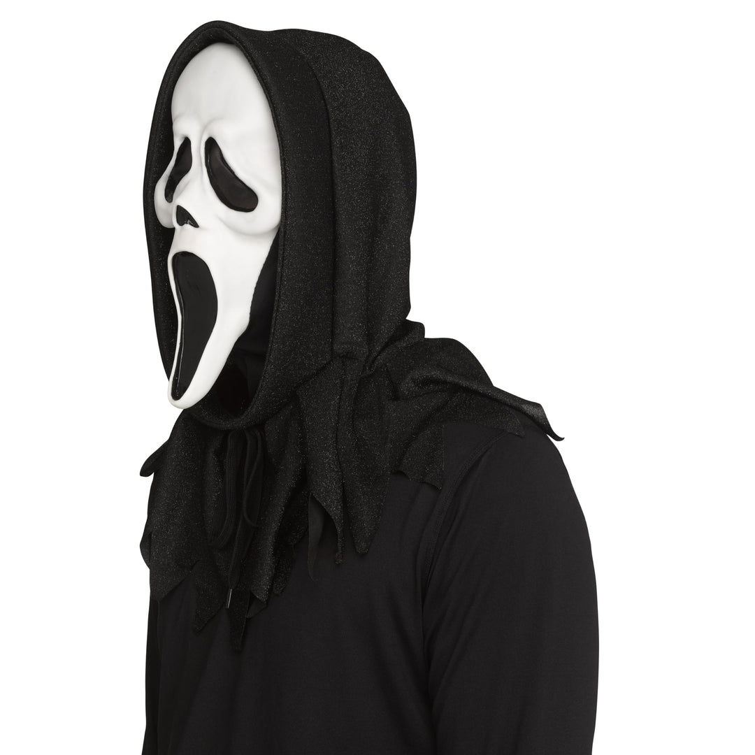 A person wearing a 30th Anniversary Ghost Face mask with black shroud shown against a plain white background.