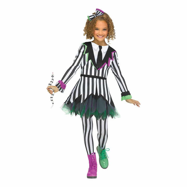 Child wearing a black and white striped Beetlejuice costume with purple and green accents on a white background